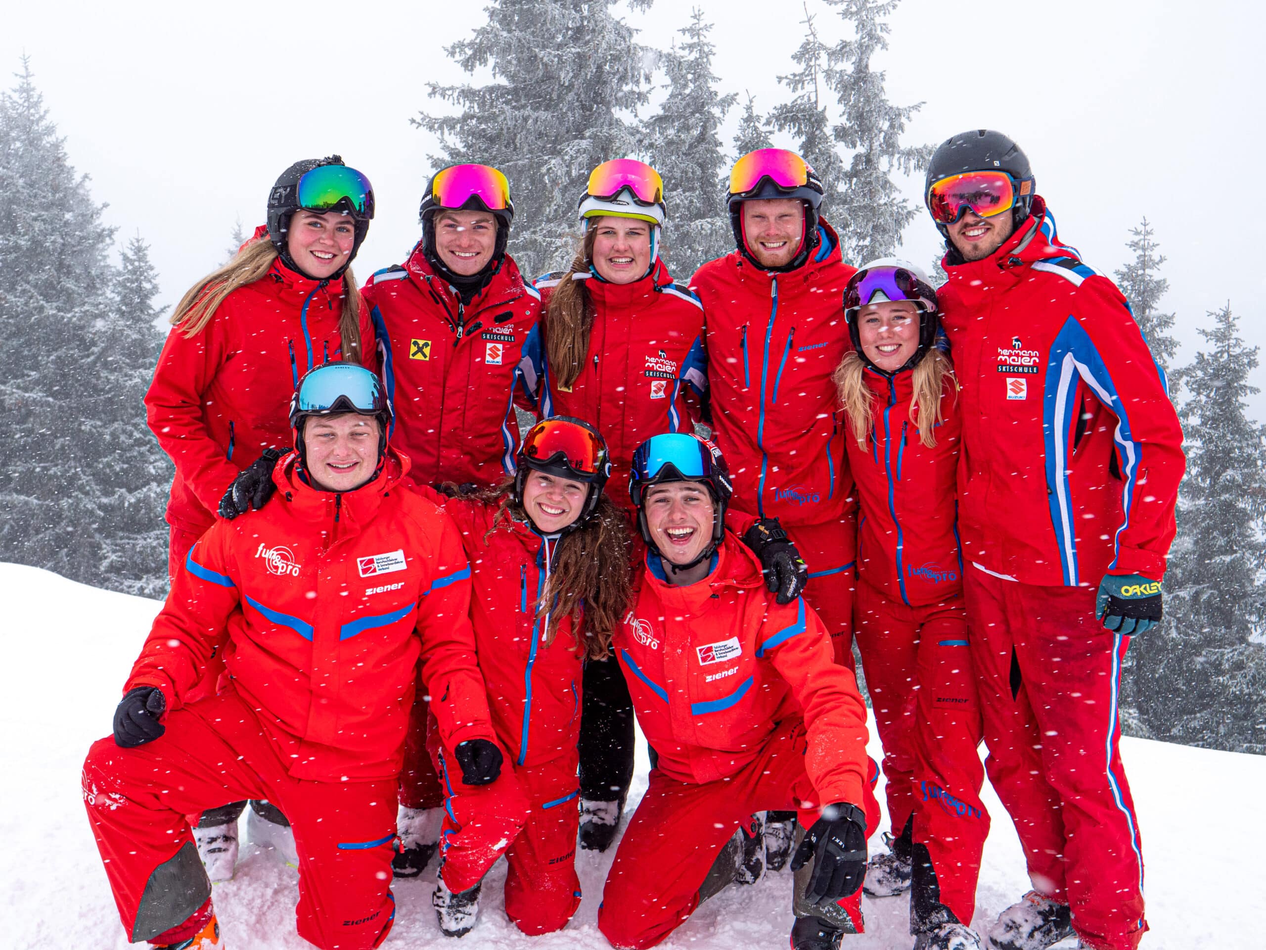 Ski instructors Snowminds red uniforms